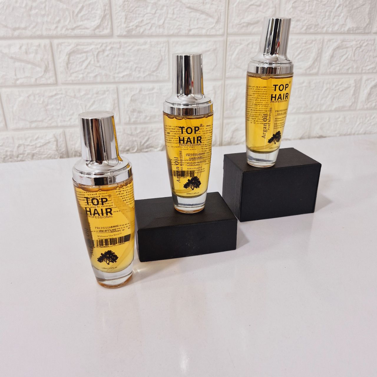 روغن آرگان حرفه ای مو برند تاپ هیر Top Hair با حجم 100 میل